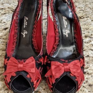 Brand New Bettie Page peep toe high heels. Size 9 black and red